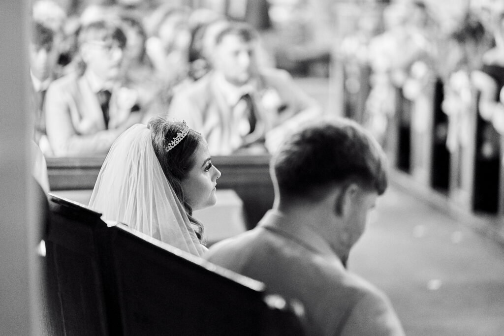 candid moment photo of bride and groom in wedding day